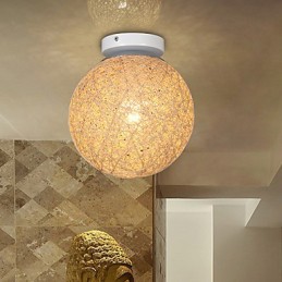 La canne compose une boule de chanvre créative et absorbe la lumière du dôme