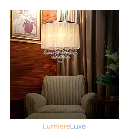 Élégante suspension en cristal à 4 lumières Élégante suspension en cristal à 4 lumières