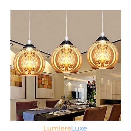 Lampe suspendue boule de verre trois Lampe suspendue boule de verre trois