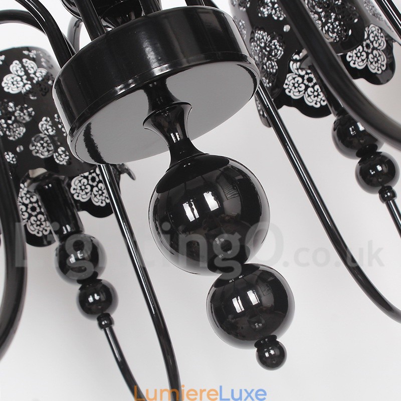Lustre moderne contemporain à 8 lumières de style bougie creuse noire