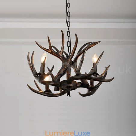 Lustre rustique artistique rétro à 4 lumières en bois de cerf noir dégradé Lustre rustique artistique rétro à 4 lumières en bois de cerf noir dégradé
