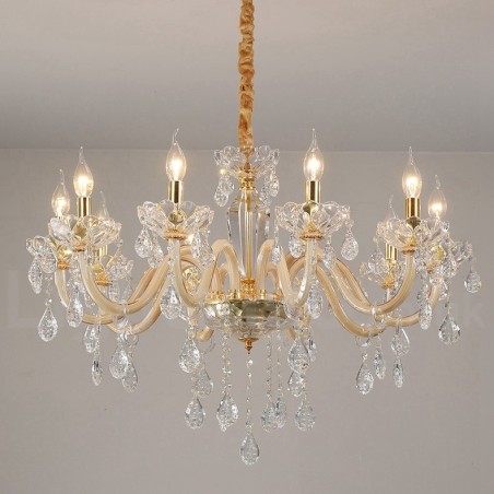 Lustre doré avec bougie en cristal transparent Lustre doré avec bougie en cristal transparent