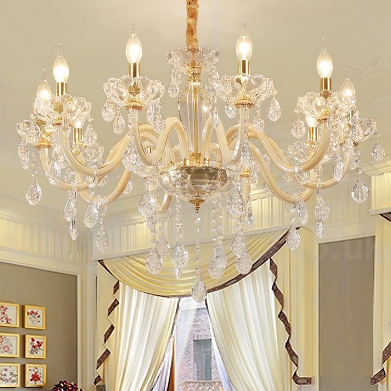 Lustre doré avec bougie en cristal transparent