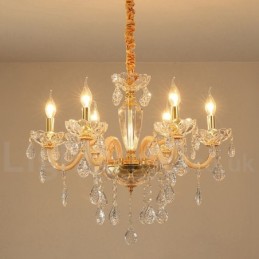 Lustre doré avec bougie en cristal transparent