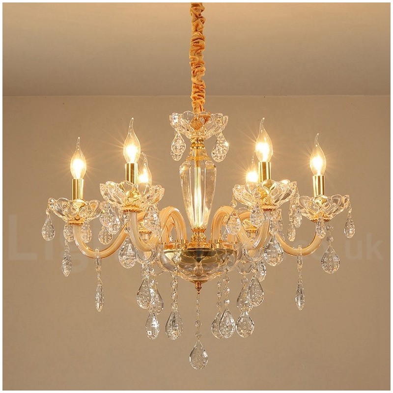 Lustre doré avec bougie en cristal transparent