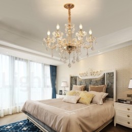 Lustre doré avec bougie en cristal transparent