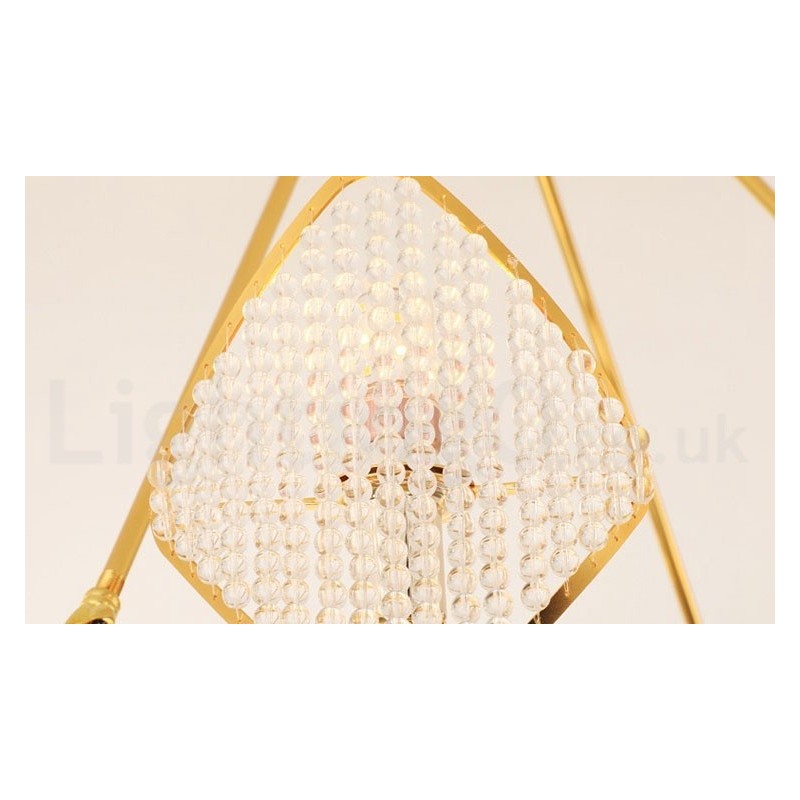 Lustre suspendu rond en cristal K9 doré postmoderne de luxe avec abat-jour en acrylique pour salle d'exposition