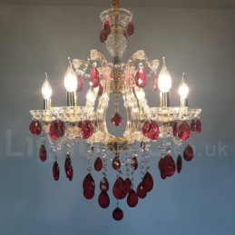 Lustre bougie doré à 6 lumières avec cristal rouge