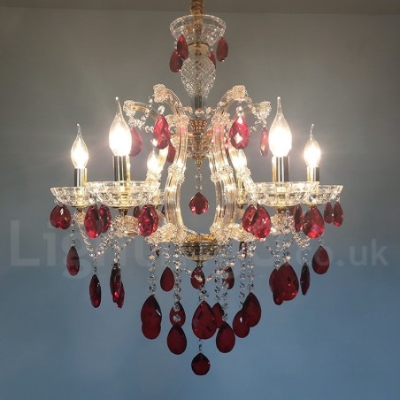 Lustre bougie doré à 6 lumières avec cristal rouge Lustre bougie doré à 6 lumières avec cristal rouge