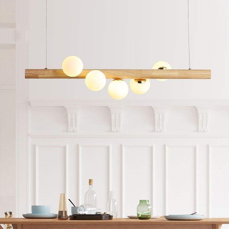 Lampe suspendue Magic Bean en bande de bois