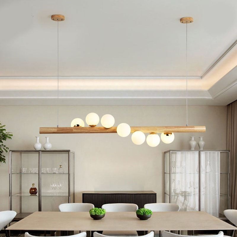 Lampe suspendue Magic Bean en bande de bois