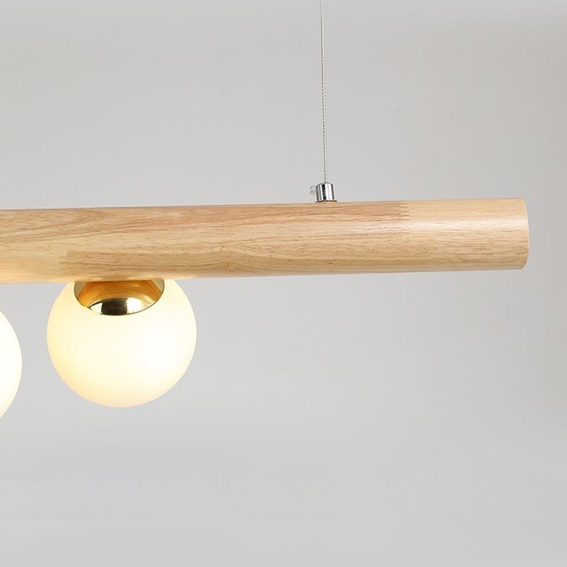 Lampe suspendue Magic Bean en bande de bois