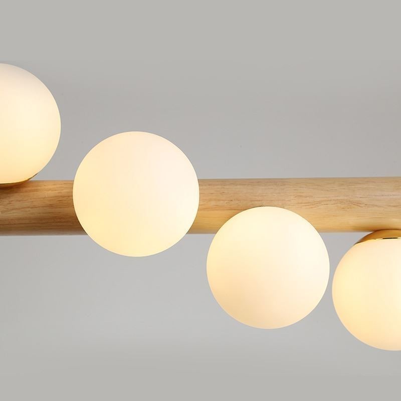 Lampe suspendue Magic Bean en bande de bois