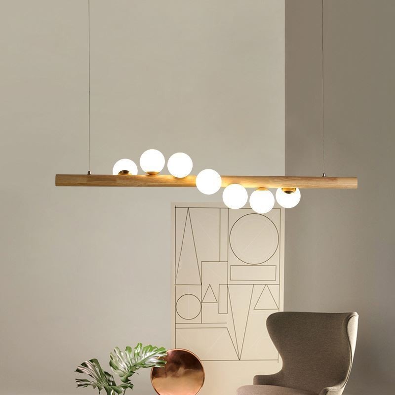 Lampe suspendue Magic Bean en bande de bois