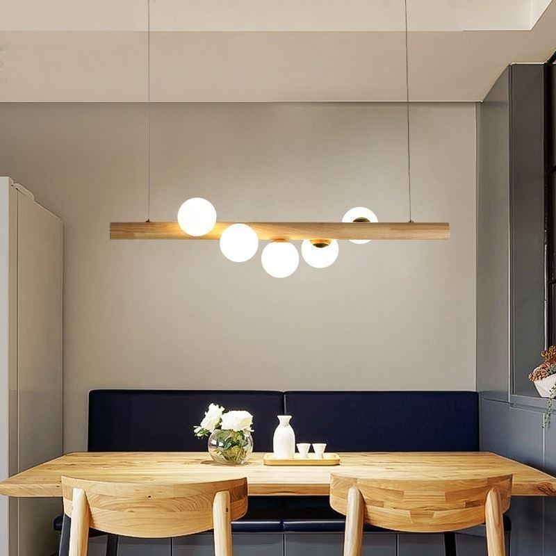 Lampe suspendue Magic Bean en bande de bois