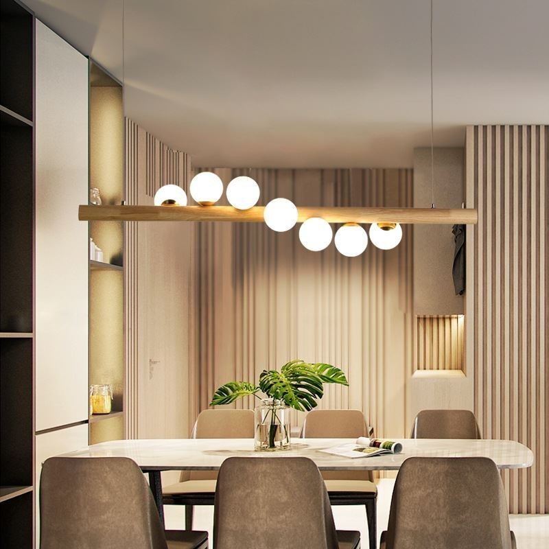 Lampe suspendue Magic Bean en bande de bois