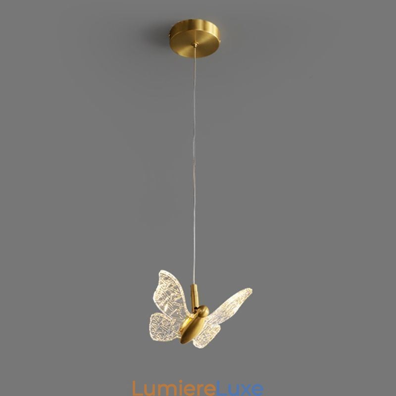 Suspension en acrylique en forme de papillon