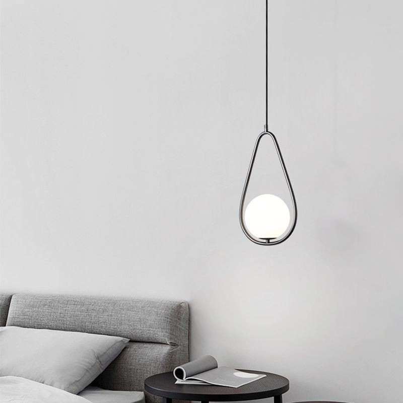 Lampe suspendue moderne en forme de globe et de goutte d'eau en verre