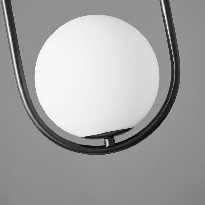 Lampe suspendue moderne en forme de globe et de goutte d'eau en verre