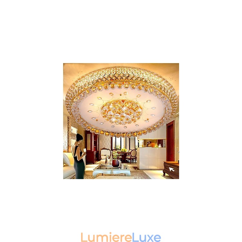 Plafonnier rond en cristal absorbant, diamètre 80 cm, contient 15 ampoules.