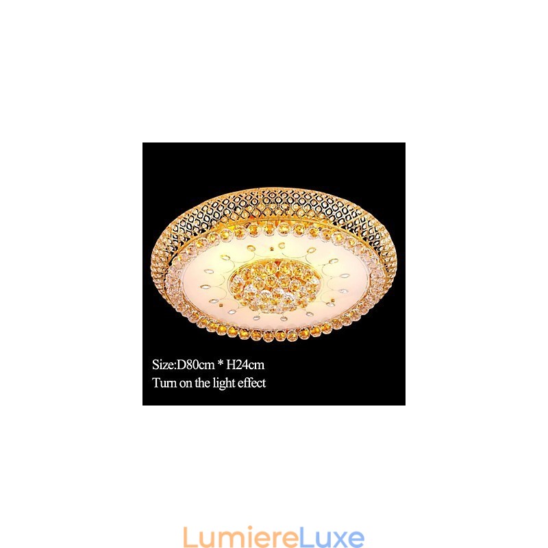 Plafonnier rond en cristal absorbant, diamètre 80 cm, contient 15 ampoules.