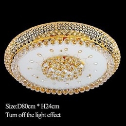 Plafonnier rond en cristal absorbant, diamètre 80 cm, contient 15 ampoules.