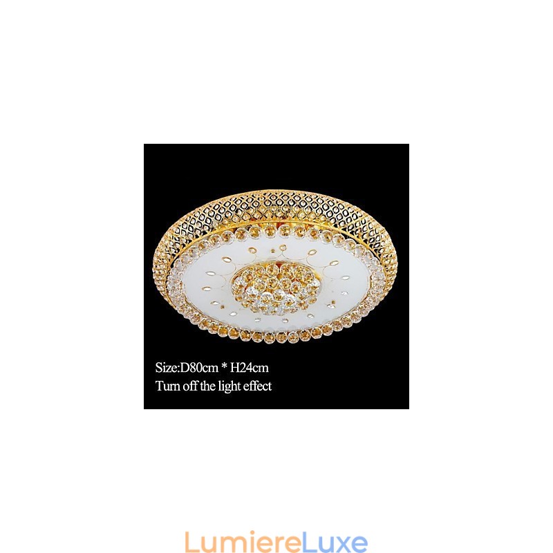 Plafonnier rond en cristal absorbant, diamètre 80 cm, contient 15 ampoules.