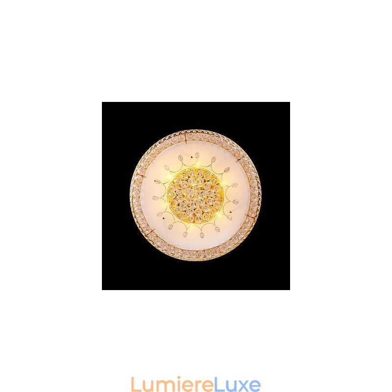 Plafonnier rond en cristal absorbant, diamètre 80 cm, contient 15 ampoules.