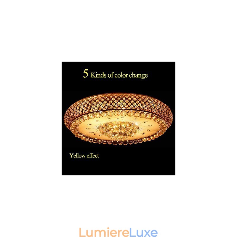 Plafonnier rond en cristal absorbant, diamètre 80 cm, contient 15 ampoules.