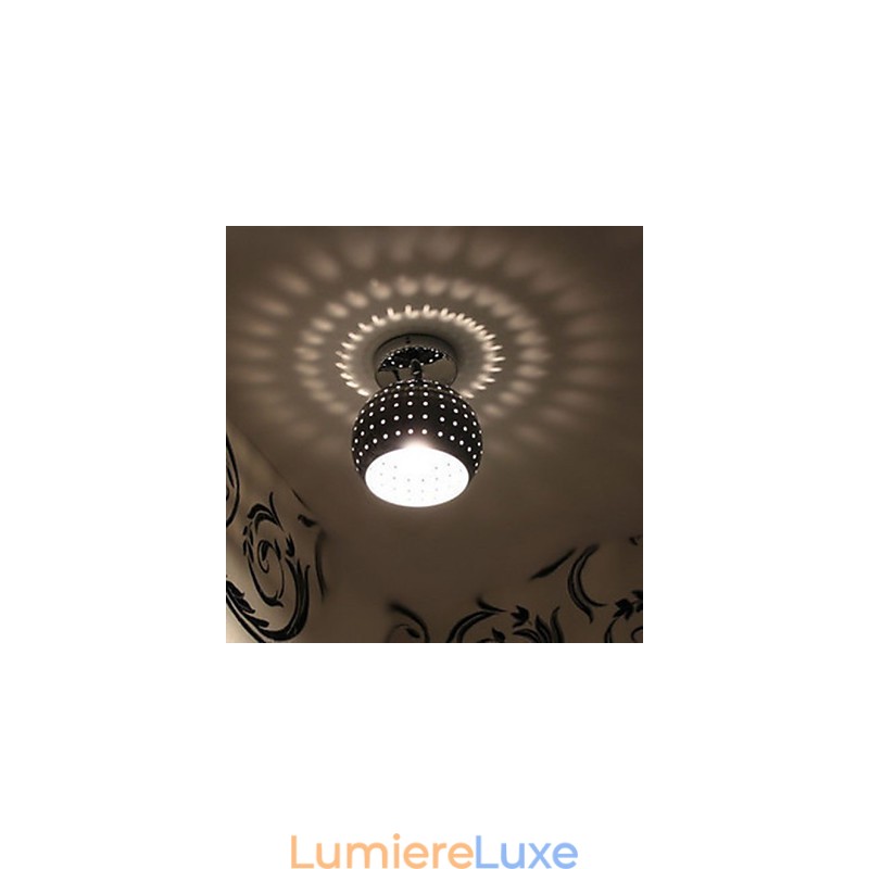 Lampe en fer forgé à dôme absorbant la lumière et la réflexion esthétique de la boule poreuse créative
