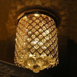 Plafonnier moderne en cristal avec finition dorée en forme de spirale