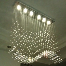Suspension 6 lumières moderne argentée avec cristaux transparents et vagues